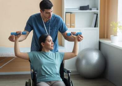 doctor-helping-patient-rehabilitation